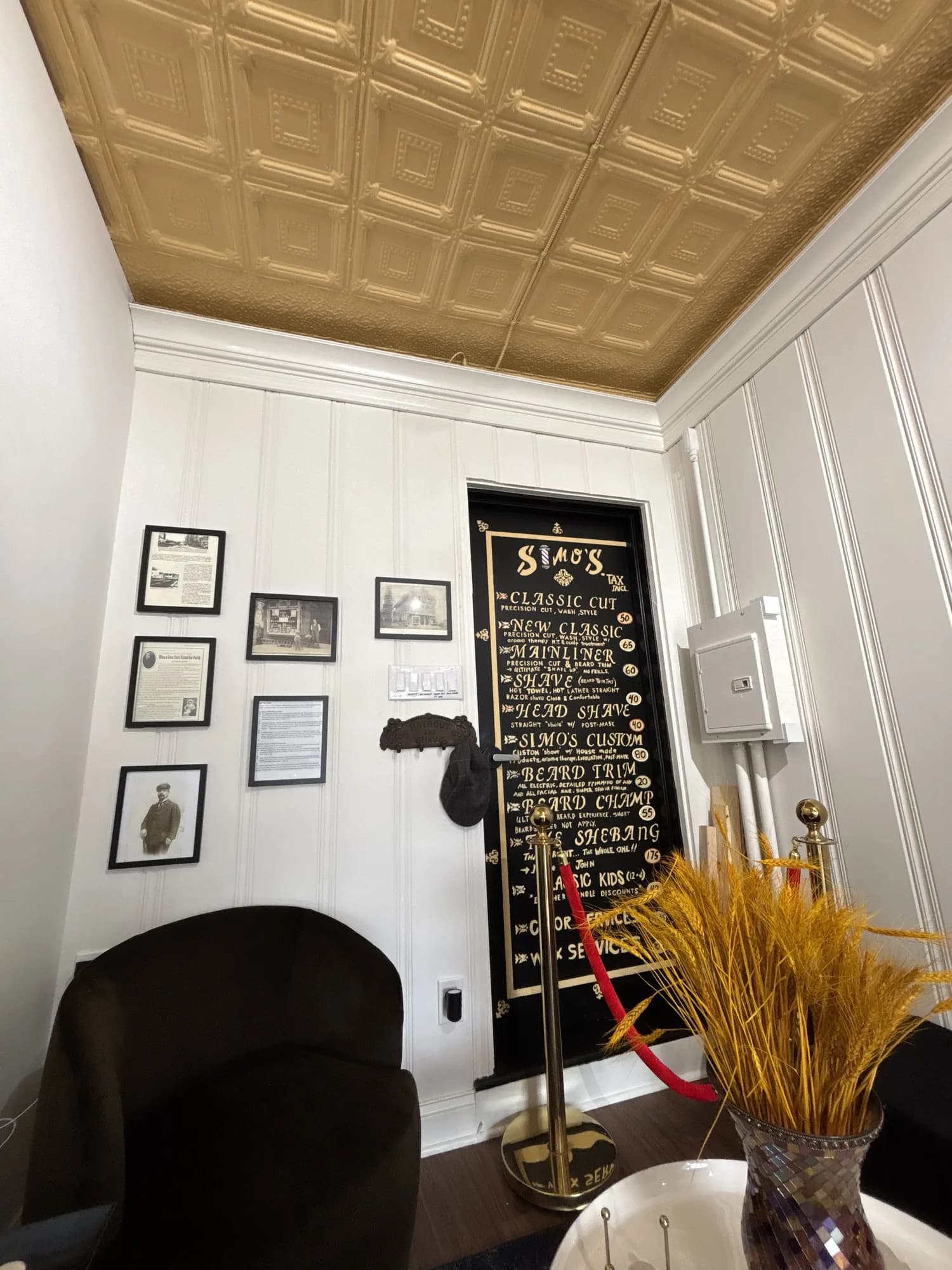 Tin ceiling, the history wall, and the Simo's price board door